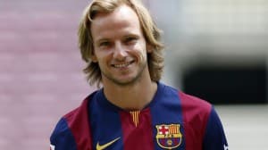 FC Barcelona's newly signed soccer player Ivan Rakitic from Croatia poses for pictures in his new jersey during his presentation at Camp Nou stadium, in Barcelona July 1, 2014. REUTERS/Albert Gea (SPAIN - Tags: SPORT SOCCER)