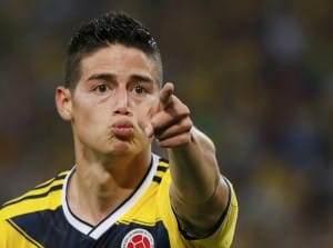 Colombia's James Rodriguez celebrates after scoring against Uruguay during their 2014 World Cup round of 16 game at the Maracana stadium in Rio de Janeiro in this June 28, 2014 file photo. Rodriguez has been shortlisted for the tournament's "Golden Ball" award for best player. REUTERS/Sergio Moraes/Files (BRAZIL - Tags: SPORT SOCCER WORLD CUP) ORG XMIT: SIN207